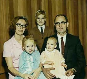 The Hovland family in fall 1969. Larry's hiding in the back, Heidi's in blue and I'm the baby in peach on Daddy's lap.