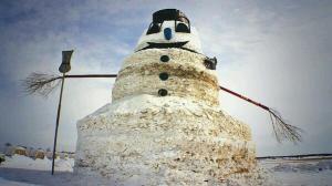 A 50-foot snowman brings a smile to the winter-weary.
