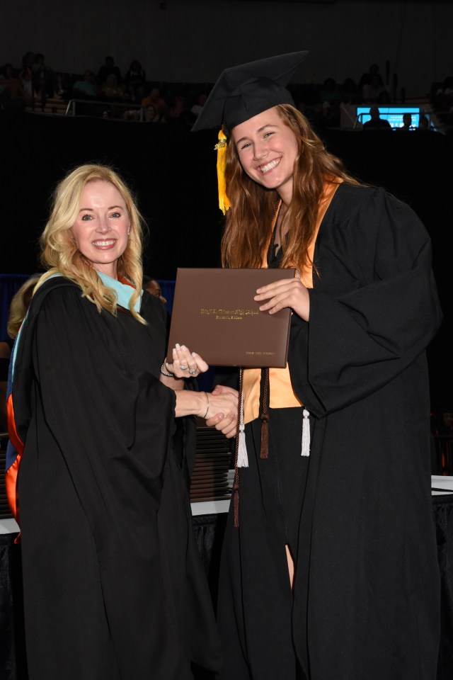 Serina with GHS principal, Ms. Jeanne Greer